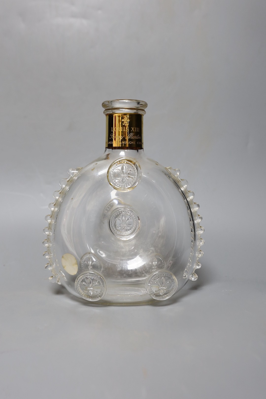 An empty bottle of Louis XIII Remy Martin Grande Champagne Cognac, carafe number DK3774 with original fitted case, stopper and box.